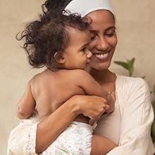 Closeup of adult holding child